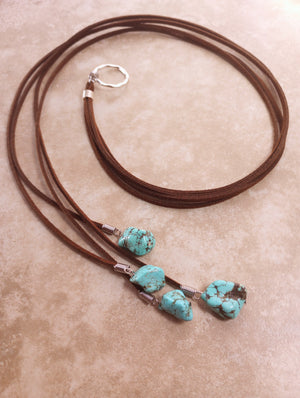 Multi-Strand Turquoise Howlite Lariat Necklace (on Dark Brown)